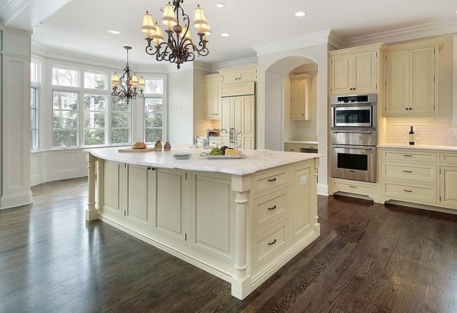 spacious living room with laminate flooring in Newton Center MA